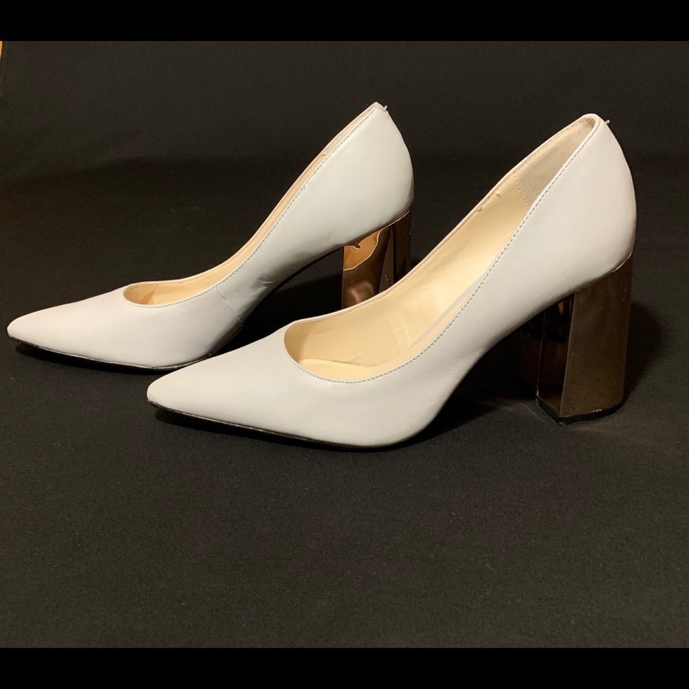 Gray leather pump with 3” mirrored rose gold heel